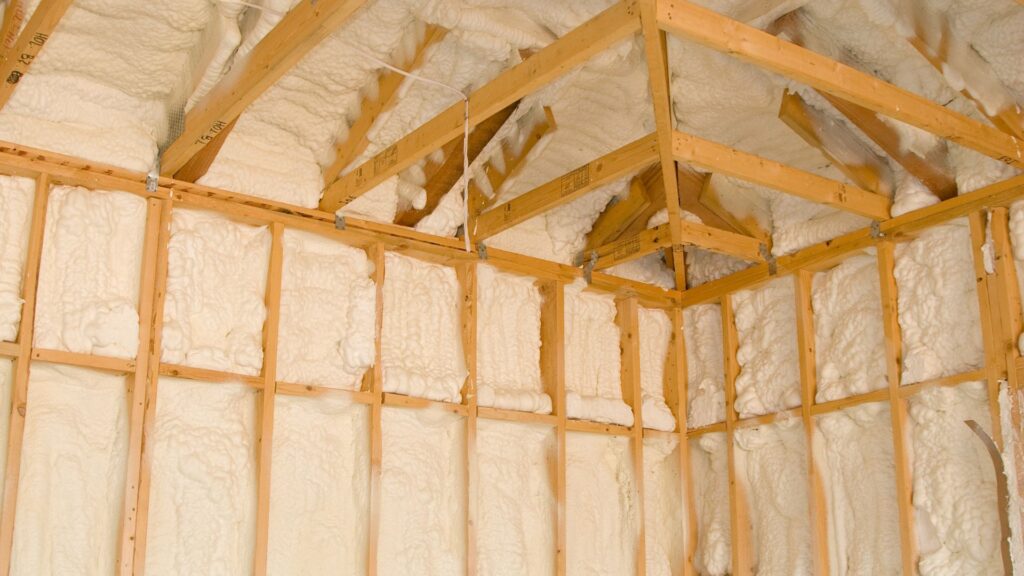 Spray foam insulation in a home being built.