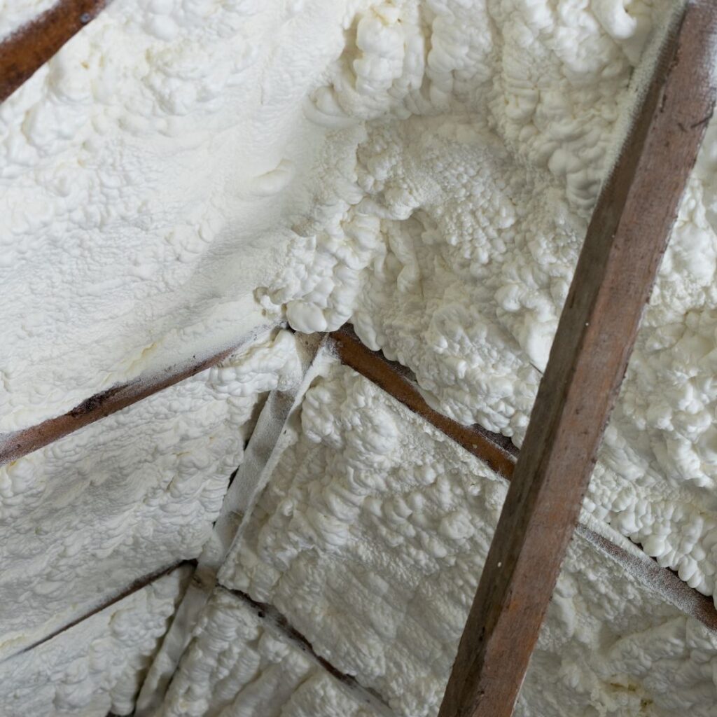 Spray foam insulation in high ceilings.