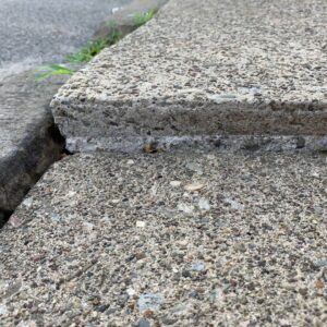 concrete with lip that can be tripped on