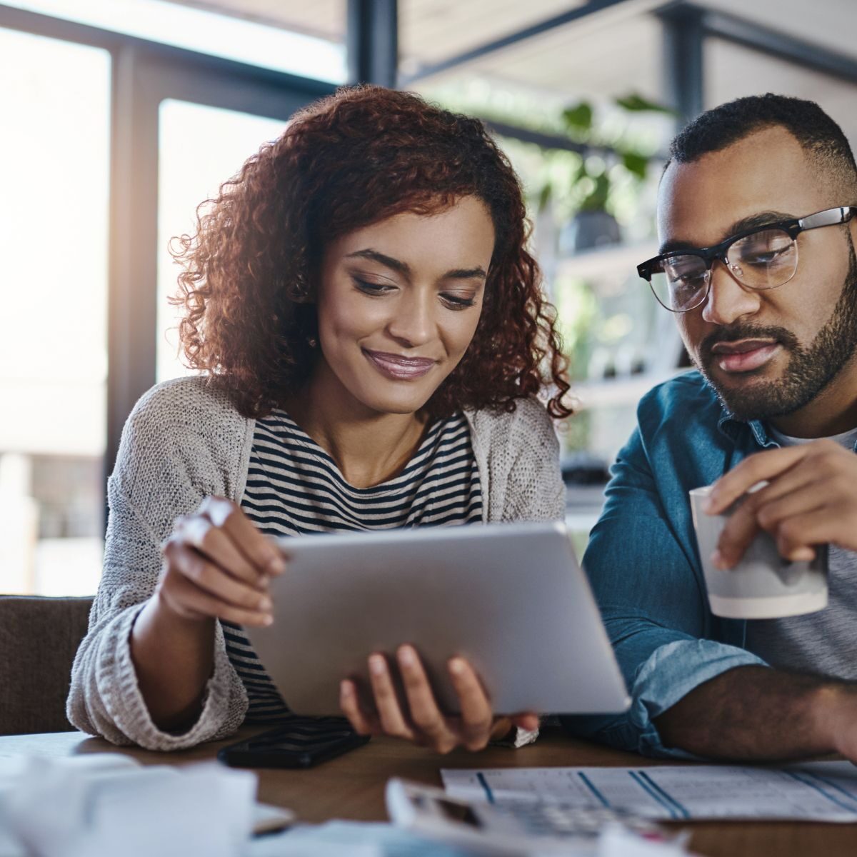 business owners looking over taxes
